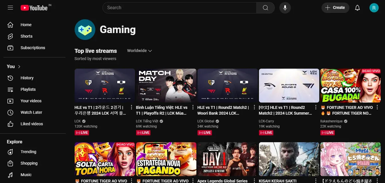 YouTube's Gaming Live page, showcasing various live gaming streams and popular game titles with viewer counts.